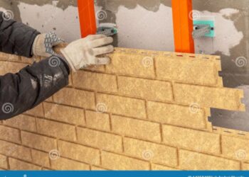 Installing Brick Siding on the Wall of the House Stock Photo - Image of ...