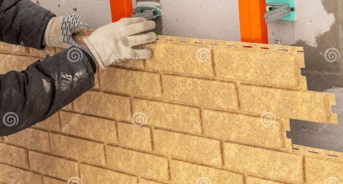 Installing Brick Siding on the Wall of the House Stock Photo - Image of ...